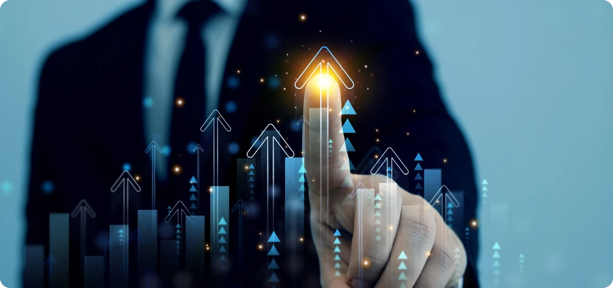 Businessman pointing at rising digital arrows.